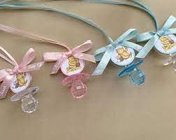 Dumbo Baby Shower Pacifier Favors Set Of 12 Clear Baby Etsy Baby Shower Necklace Baby Bear Baby Shower Dumbo Baby Shower