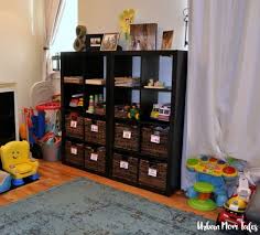 Love that i could see what i have without packing. Actually Conquer Clutter With Living Room Toy Organization Urban Mom Tales