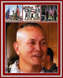 CONGRATULATIONS!!! Guam Air National Guard's Col. Johnny Lizama sports a  smile as Gov. Eddie Calvo, left, and his wife, Doris "Dee" Lizama pins  stars