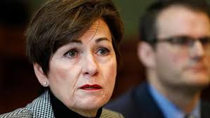 Iowa governor flew to game