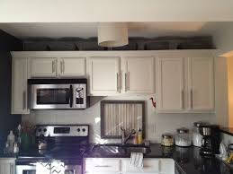 Baskets Above Kitchen Cabinets Cute And Functional Above Kitchen Cabinets Kitchen Cabinets On A Budget Small Kitchen Storage Solutions