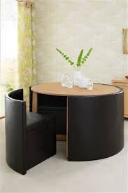 Table sets in crisp shades like cream or bisque lighten up your palette, making the space feel larger. Hideaway Dining Set Space Saving Furniture Small Space Dining Set Space Saving Dining Table