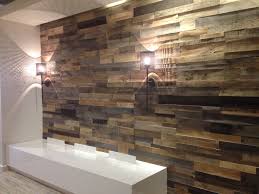 Reclaimed wood walls in your bathroom can create contrast, especially with different countertops like soapstone and marble. Reclaimed Wood Paneling Sustainable Lumber Company