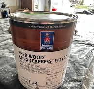 Best primer for filling woodgrain? I am spraying color SW PRECAT