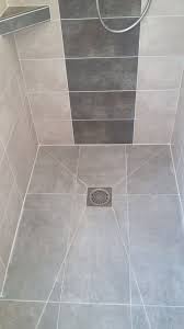 Use faux wood bathroom tiles. 38 Fantastic Terrific Tiles Images Shower Floor Bathroom Layout Small Shower Room