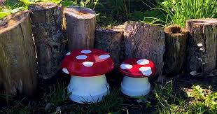 Garden mushrooms from logs and painted steel bowls. Create Stunning Garden Decorations Using Only Terra Cotta Pots