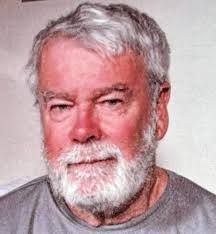 Historical photo of family reading together