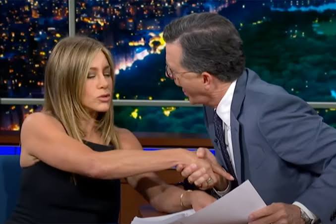 Stephen Colbert Jokingly Tries to Kiss Jennifer Aniston After On-Air  Audition for 'The Morning Show'