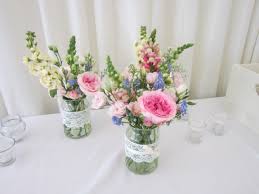 Pin By Sharon Mesher Wedding Flowers On Jam Jar Wedding Flower Ideas Decorative Jars Wedding Jam Jar Flowers Flowers In Jars