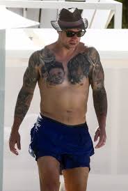 Latest photos, videos and stories about wayne bridge. Wayne Bridge Shows Off Huge Tattoos Of His Children S Faces On His Chest As He Holidays With Wife Frankie