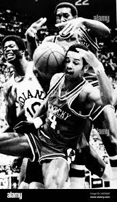 Indiana All-Star Thad Garner, left, and Kentucky All-Stars Norris Beckley,  top, and Jerry Eaves (4) find themselves tangled up trying for this rebound  during the Indiana-Kentucky All-Star game in Indianapolis, June 26,