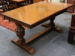 Antique metal kitchen tables expandshare appendix removal. A 1940s Oak Extending Dining Table Blind Carved Apron Supported On Heavy Turned Jacobean Style Co