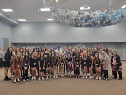 Lake Erie College volunteers participate in Winter Wonderland Special Needs  Prom