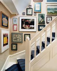 With an elegant staircase serving as a focal point, careful selection and placement if a painting or print is oversized, its extreme height may not allow placement at eye level or proper viewing from the stairs. 33 Stairway Gallery Wall Ideas To Get You Inspired Shelterness