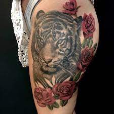 Top 61 Best Tiger Rose Tattoo Ideas 2021 Inspiration Guide Rose Tattoos Rose Tattoos For Women Tiger Rose Tattoo