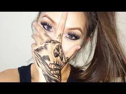 Top 10 Best Hand Face Tattoo Designs In 2018 Skull Hand Tattoo Beauty Tattoos Face Tattoos
