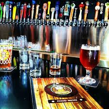 Frank Steins Eatery Pub In Orlando Fl American Grill Pairing A Hot Dog Heavy Menu 300 Beers In Barlike Digs With Pool Ske Steins Craft Brewing Eatery