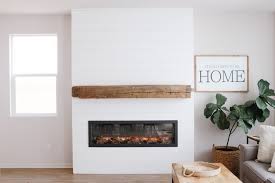 For the green friendly approach to fireplaces within the home, a pleasant hearth 20 electric crackling natural wood log without a real wood stove in your home. Diy Shiplap Electric Fireplace Build With Mantel Healthy Grocery Girl