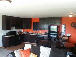 Kraftmaid sonora 14 5/8 x 14 5/8 in. Dark Cabinets Orange Wall Brown Burnt Orange Kitchen Redone Remodel Kitchen With Dark Brown Cabinets Dark Brown Cabinets Brown Cabinets