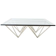 You can pair the coffee table with the matching pyramid trunk end table for a complete set. Chrome Pyramid Cocktail Table After Paolo Piva For Sale At 1stdibs
