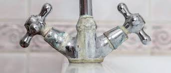 how do i remove limescale from taps?