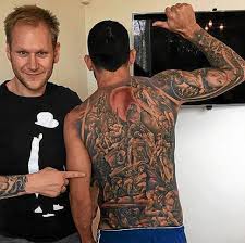 Body art guru help us explain the meaning of antoine's body paintings. Tevez The Most Tattooed Back In Football Photo Galleries Marca Com