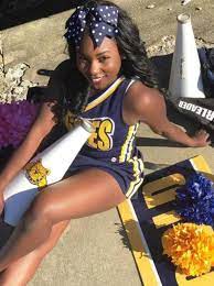 Pin By Monola Sentee On Cheerleading Cheerleading Outfits Black Cheerleaders Cheer Girl