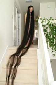 Photos Woman With The Longest Hair Trendysturvs Blog Worlds Longest Hair Long Hair Styles Super Long Hair