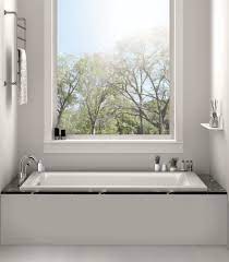 Low profile chrome tub filler with porcelain lever handles. The 8 Best Small Bathtubs Of 2021