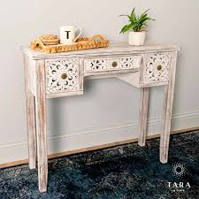 A regency mahogany sofa table, the top with walnut crossbanding, two rectangular pillar side supports each with two feet terminating in brass lion claw castors. Jessie Antique White Console Table Allens