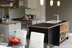 Bespoke Birch Ply And Formica Kitchen Comprising Of White Worktops And White Cabinets With Grab Handles And A Plywood Kitchen Kitchen Furniture White Worktop