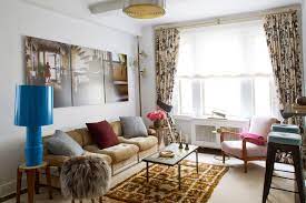 Curtains for living room ideas with tall ceilings with beams and white molding. How To Hang Curtains An Easy 4 Step Guide Plus Styling Tips Architectural Digest