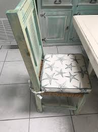 Then, layer a blue dining chair pad on top of each seat for a pop of color. Dining Chair Pad With Ties Kitchen Chair Cushions Seat Etsy