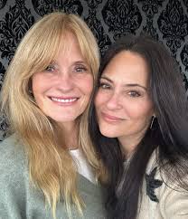Diana Rigg trying out a car at The Motor Show 1965. (Photo by Fred Mott/Evening  Standard )