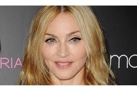 Le mari d'Elton John s'en prend à Madonna