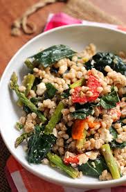 We served it over couscous with slivered almonds and golden raisins, and sprinkled a bit of crumbled feta on top. Farro Salad With Honey Roasted Garlic Tomatoes Asparagus And Kale Joanne Eats Well With Others