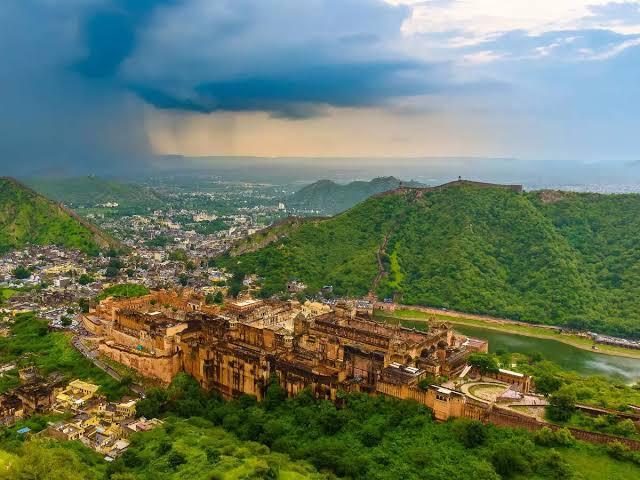 Amer Fort above the waters of Maota Lake, AI generated
