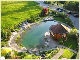 Hotel With Natural Swimming Pond In Fuschl Salzburg Province The Garden Hotel Sonnleitn In Fuschl Am See In Natural Swimming Ponds Natural Pond Swimming Pond