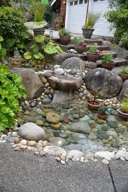 Steingarten Anlegen Hang Gestaltung Grosse Steine Teich Treppe Gruene Pflanzen Garten Wasserspiel Garten Steingarten