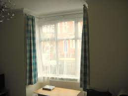 These bay window curtains just here shows a pair of lined and interlined double pinch pleat curtains. Curtain Idea For Box Window Curtains Box Window Square Windows