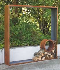 Cortenstahl Holzlege Fenster Rund Sichtschutz Garten Holz Gartengestaltung Ideen Holzwand Garten