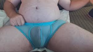 Struggling to stuff my cock and balls in cock ring. Then cumming in my see  thru briefs