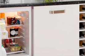 In the process of fitting a 70/30 fridge freezer into a tall cabinet. How To Buy The Best Integrated Fridge Which