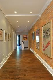 Lower your living room 2. Easy Ways To Make Your Hallways Look Bigger Brighter