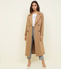 It's not made from it might sound cheap if you're used to natural fibers like wool and cashmere, but this mix is what keeps your overcoat in rotation come winter. The First Of The Coats Does My Bum Look 40 In This Bloglovin