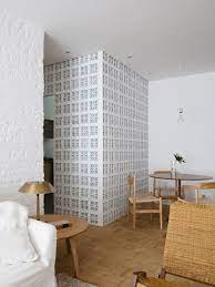 Paint the cinder blocks in an appealing light color to bring a modern touch to the bench. The Breeze Block Trend Is Being Taken Indoors Architectural Digest