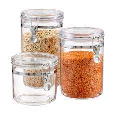 The exceptionally clear material lets you see inside at a glance and the tight lids protect against dust. Acrylic Canisters The Container Store