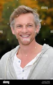 Monaco di Baviera, Germania. 08 ott 2013. Attore olandese Barry Atsma come  David pone durante le riprese del film TV 'Goettliche Funken' ('Divina  scintille') di Monaco di Baviera, Germania, 08 ottobre 2013.