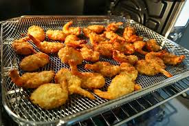 Unfortunately we dove in hungrily before i got pics of the whole so you just get a bite. Breville Smart Oven Air Coconut Shrimp 1 Mary S Happy Belly