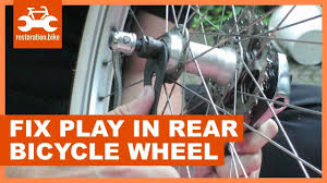 Mountain bike rear wheel assembly. How To Fix Play In Rear Bicycle Wheel Restoration Bike